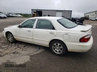 2001 Mazda 626 LX z VIN 1YVGF22C515251837, wystawiony jako Copart lot #56854605 z przebiegiem 173 148 mil mil oraz Szkody całkowita. Historia ofert i sprzedaży dostępna na DreamBid. Obrazek 2.
