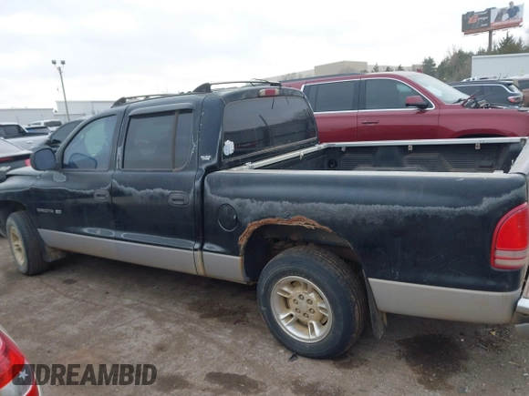 2000 Dodge Dakota Sport with VIN 1B7GL2AX4YS607628, listed as a IAAI auction lot 41115728 with Not provided miles and . Bid and sale history available at DreamBid. Image 13.