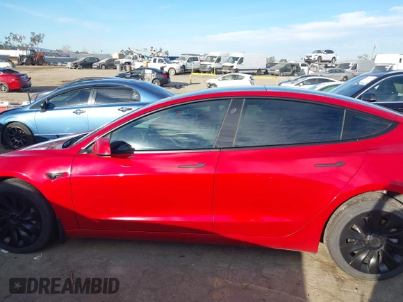 2022 Tesla Model 3 with VIN 5YJ3E1EA1NF288903, listed as a IAAI auction lot 41610215 with 96,050 mi miles and . Bid and sale history available at DreamBid. Image 14.
