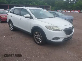 2013 Mazda CX-9 Grand Touring z VIN JM3TB2DA6D0414080, wystawiony jako IAAI lot #42310153 z przebiegiem 190 991 mil mil oraz . Historia ofert i sprzedaży dostępna na DreamBid. Obrazek 1.