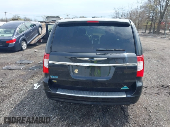 2011 Chrysler Town & Country Touring L with VIN 2A4RR8DG7BR641782, listed as a IAAI auction lot 42042025 with 141,884 mi miles and . Bid and sale history available at DreamBid. Image 15.