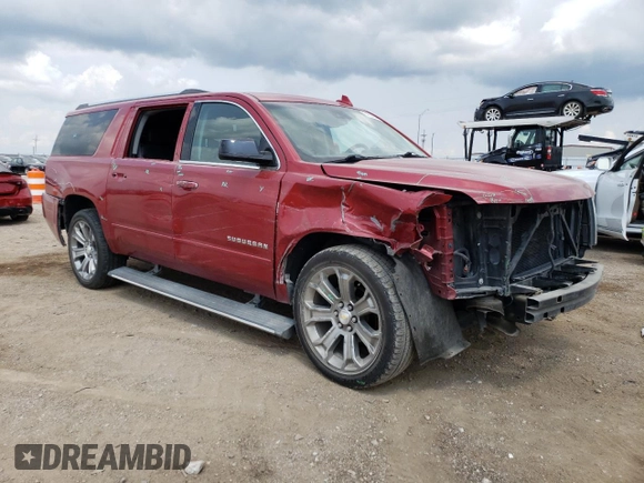 2015 Chevrolet Suburban LTZ with VIN 1GNSKKKC6FR556105, listed as a Copart auction lot 64034304 with 106,269 mi miles and Salvage Title. Bid and sale history available at DreamBid. Image 4.