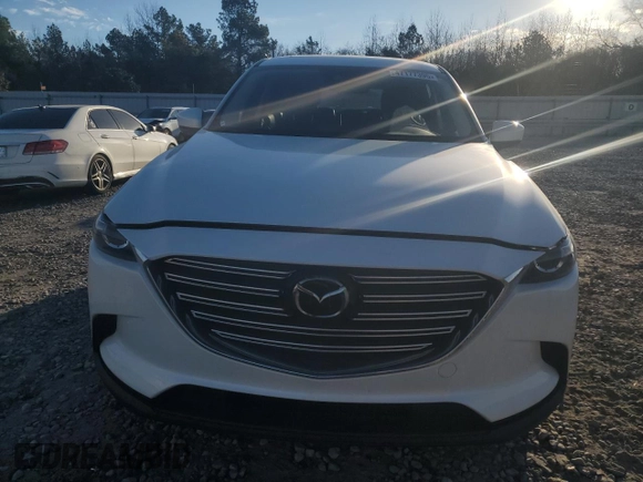 2023 Mazda CX-9 Touring with VIN JM3TCBCY3P0657068, listed as a Copart auction lot 47177395 with 21,869 mi miles and Salvage title. Bid and sale history available at DreamBid. Image 5.