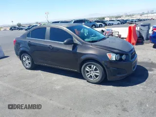 2013 Chevrolet Sonic LT with VIN 1G1JC5SBXD4247573, listed as a IAAI auction lot 42021798 with 114,741 mi miles and . Bid and sale history available at DreamBid. Image 1.