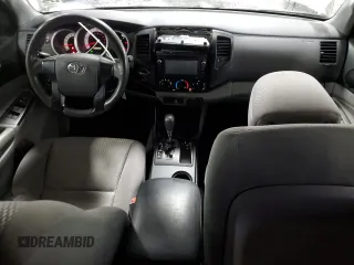 2014 Toyota Tacoma with VIN 5TFLU4ENXEX089927, listed as a Copart auction lot 52140565 with 112,924 mi miles and Salvage Title. Bid and sale history available at DreamBid. Image 8.