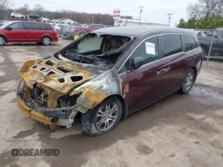 2011 Honda Odyssey EX-L with VIN 5FNRL5H64BB059576, listed as a IAAI auction lot 41903160 with 150,000 mi miles and . Bid and sale history available at carsss.com. Image 2.