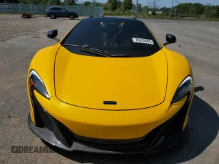 2016 McLaren 650S z VIN SBM11FAA6GW006251, wystawiony jako Copart lot #70628064 z przebiegiem 13 452 mil mil oraz Szkody całkowita. Historia ofert i sprzedaży dostępna na DreamBid. Obrazek 5.