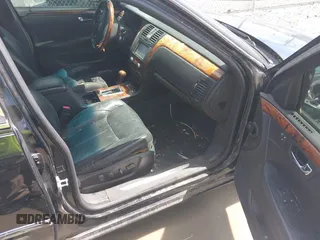 2006 Cadillac DTS 1SE with VIN 1G6KD57976U126634, listed as a IAAI auction lot 41972104 with 148,992 mi miles and . Bid and sale history available at DreamBid. Image 5.