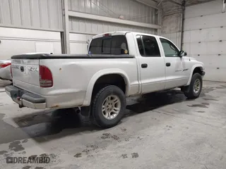 2001 Dodge Dakota Sport with VIN 1B7HG2AN31S229220, listed as a IAAI auction lot 42100843 with 134,034 mi miles. Bid and sale history available at carsss.com. Image 4.