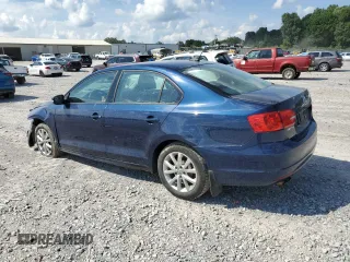 2012 Volkswagen Jetta SE with VIN 3VWDP7AJ7CM062149, listed as a Copart auction lot 62779485 with 154,771 mi miles and Salvage title. Bid and sale history available at DreamBid. Image 2.