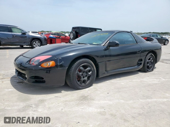 1999 Mitsubishi 3000GT z VIN JA3AM44H6XY002443, wystawiony jako Copart lot #57155505 z przebiegiem 201 588 mil mil oraz Czysty tytuł • Clean title. Historia ofert i sprzedaży dostępna na DreamBid. Obrazek 1.