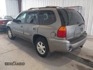 2005 GMC Envoy SLE z VIN 1GKDT13S252285747, wystawiony jako IAAI lot #42340642 z przebiegiem Nie podano mil oraz . Historia ofert i sprzedaży dostępna na DreamBid. Obrazek 3.