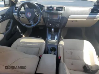2012 Volkswagen Jetta TDI w/Premium & Nav z VIN 3VWLL7AJ7CM011404, wystawiony jako Copart lot #61536925 z przebiegiem 133 183 mil mil oraz Szkoda całkowita • Salvage title. Historia ofert i sprzedaży dostępna na DreamBid. Obrazek 8.