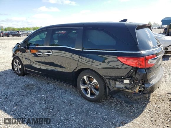 2019 Honda Odyssey Touring with VIN 5FNRL6H84KB014970, listed as a Copart auction lot 53571835 with 116,219 mi miles and Salvage title. Bid and sale history available at DreamBid. Image 2.