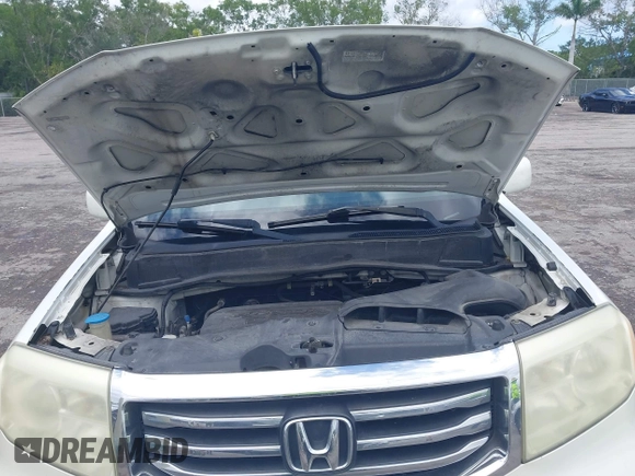 2012 Honda Pilot Touring with VIN 5FNYF3H9XCB035494, listed as a IAAI auction lot 42011362 with 271,887 mi miles and . Bid and sale history available at carsss.com. Image 10.