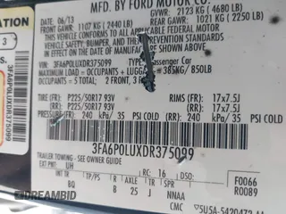 2013 Ford Fusion SE Hybrid with VIN 3FA6P0LUXDR375099, listed as a IAAI auction lot 41914387 with 133,178 mi miles. Bid and sale history available at carsss.com. Image 9.