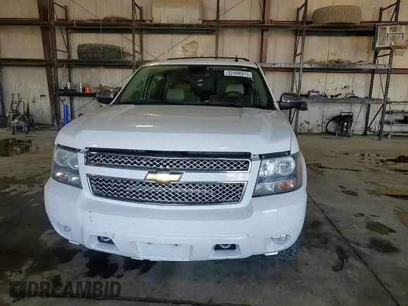2007 Chevrolet Tahoe LTZ with VIN 1GNFK13007J313566, listed as a Copart auction lot 52498975 with 234,744 mi miles and Salvage title. Bid and sale history available at DreamBid. Image 12.