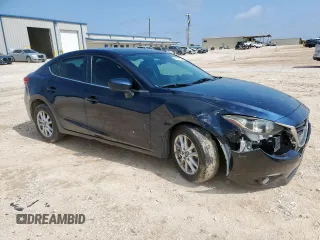 2015 Mazda 3 i Grand Touring with VIN 3MZBM1W77FM219595, listed as a Copart auction lot 61041105 with 140,846 mi miles and Salvage title. Bid and sale history available at DreamBid. Image 4.