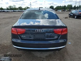 2012 Audi A8 z VIN WAURVAFD2CN021722, wystawiony jako Copart lot #58353745 z przebiegiem 117 302 mil mil oraz Szkoda całkowita • Salvage title. Historia ofert i sprzedaży dostępna na DreamBid. Obrazek 6.