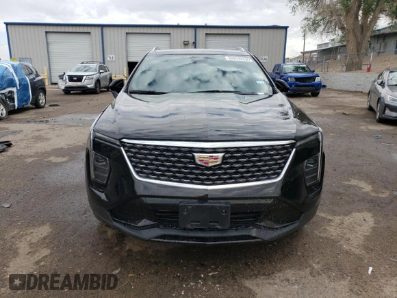 2024 Cadillac XT4 FWD Premium Luxury z VIN 1GYFZCR43RF221412, wystawiony jako Copart lot #55507885 z przebiegiem 23 702 mil mil oraz Tytuł czysty. Historia ofert i sprzedaży dostępna na DreamBid. Obrazek 5.
