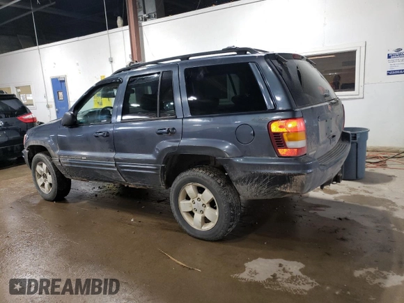 2001 Jeep Grand Cherokee Limited with VIN 1J4GW58N01C664996, listed as a Copart auction lot 58339825 with 288,153 mi miles and Salvage title. Bid and sale history available at DreamBid. Image 2.