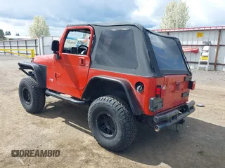 2005 Jeep Wrangler X with VIN 1J4FA39S35P358201, listed as a IAAI auction lot 42080407 with 130,110 mi miles. Bid and sale history available at carsss.com. Image 3.
