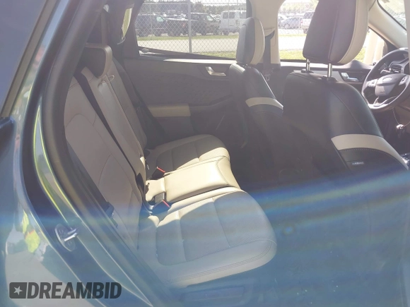 2020 Ford Escape SE Sport Hybrid with VIN 1FMCU9BZ6LUC38008, listed as a IAAI auction lot 42143784 with 81,804 mi miles and . Bid and sale history available at DreamBid. Image 8.