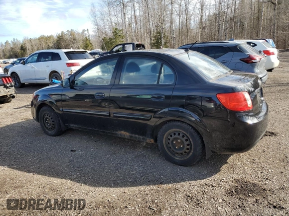 2011 Kia Rio with VIN KNADH4B39B6848061, listed as a Copart auction lot 49305225 with 235,939 mi miles and Clean Title. Bid and sale history available at DreamBid. Image 2.