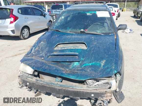 1998 Subaru Legacy Outback with VIN 4S3BG6857W7617838, listed as a IAAI auction lot 42800728 with 219,079 mi miles and . Bid and sale history available at DreamBid. Image 6.