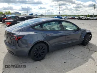 2023 Tesla Model 3 z VIN 5YJ3E1EA0PF677471, wystawiony jako Copart lot #57661625 z przebiegiem 20 326 mil mil oraz Szkoda całkowita • Salvage title. Historia ofert i sprzedaży dostępna na DreamBid. Obrazek 3.