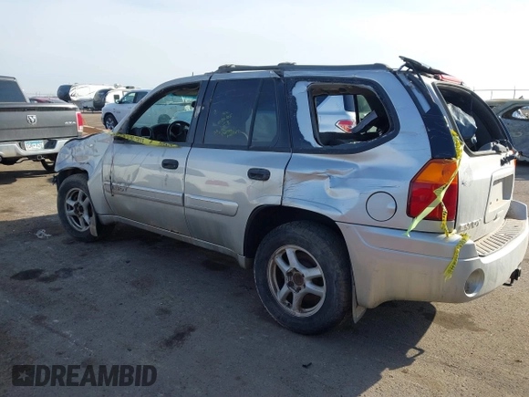 2004 GMC Envoy SLT with VIN 1GKDT13S742133932, listed as a IAAI auction lot 41598339 with 168,651 mi miles and . Bid and sale history available at DreamBid. Image 3.