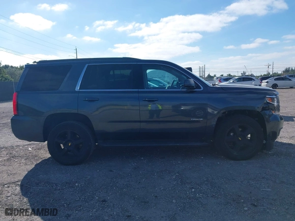 2020 Chevrolet Tahoe LT with VIN 1GNSCBKC4LR246060, listed as a IAAI auction lot 41272902 with 105,417 mi miles. Bid and sale history available at carsss.com. Image 12.