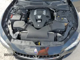 2016 Maserati Ghibli z VIN ZAM57XSAXG1174741, wystawiony jako Copart lot #51975655 z przebiegiem 127 182 mil mil oraz Tytuł czysty. Historia ofert i sprzedaży dostępna na DreamBid. Obrazek 11.