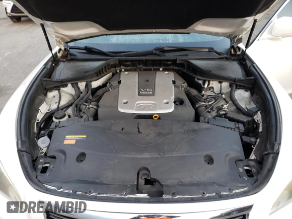 2013 Infiniti M z VIN JN1BY1AR7DM600665, wystawiony jako Copart lot #77931154 z przebiegiem Nie podano mil oraz Nie do naprawy • Non repairable. Historia ofert i sprzedaży dostępna na DreamBid. Obrazek 11.