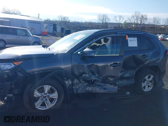 2020 Toyota RAV4 XLE with VIN 2T3P1RFV2LW130185, listed as a IAAI auction lot 42033372 with 98,667 mi miles and . Bid and sale history available at DreamBid. Image 6.