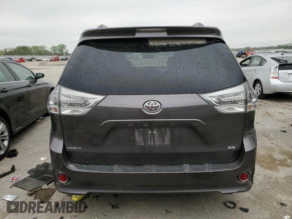 2014 Toyota Sienna SE с VIN 5TDXK3DC1ES519741, выставлен на аукционе Copart как лот 53892035 с пробегом Не указан миль и Списание • Salvage title. История ставок и продаж доступна на DreamBid. Изображение 6.