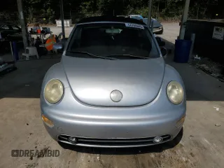 2003 Volkswagen Beetle GLS z VIN 3VWCK21Y33M326199, wystawiony jako Copart lot #54796685 z przebiegiem 142 574 mil mil oraz Szkoda całkowita • Salvage title. Historia ofert i sprzedaży dostępna na DreamBid. Obrazek 5.