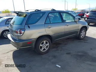2001 Lexus RX 300 with VIN JTJGF10U710086704, listed as a IAAI auction lot 42183875 with 221,612 mi miles and . Bid and sale history available at DreamBid. Image 4.