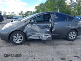 2009 Toyota Prius with VIN JTDKB20U693486715, listed as a IAAI auction lot 41689082 with 154,482 mi miles. Bid and sale history available at carsss.com. Image 6.