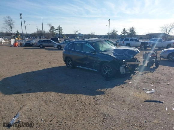2018 BMW X1 xDrive28i with VIN WBXHT3C37J5K23855, listed as a IAAI auction lot 41442191 with 1 mi miles. Bid and sale history available at carsss.com. Image 1.
