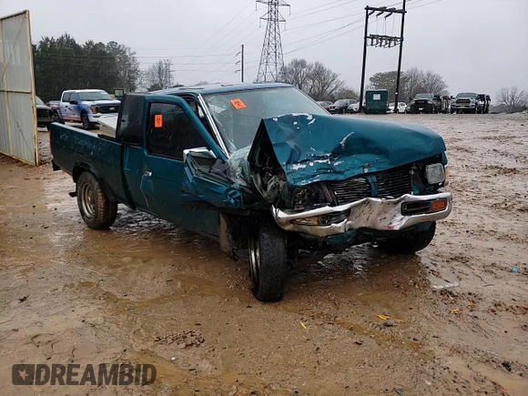 1997 Nissan Frontier XE with VIN 1N6SD16Y2VC338776, listed as a Copart auction lot 45020595 with 243,030 mi miles and Salvage title. Bid and sale history available at DreamBid. Image 11.