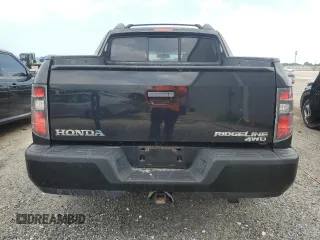 2014 Honda Ridgeline Sport with VIN 5FPYK1F75EB001197, listed as a Copart auction lot 65932295 with 121,862 mi miles and Salvage title. Bid and sale history available at DreamBid. Image 6.