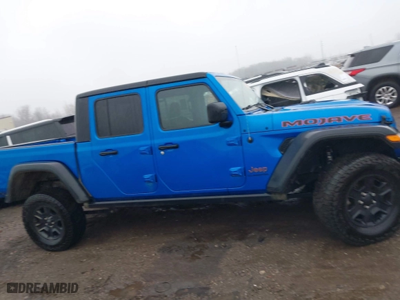 2022 Jeep Gladiator Mojave with VIN 1C6JJTEG1NL128530, listed as a IAAI auction lot 41111344 with 56,119 mi miles. Bid and sale history available at carsss.com. Image 13.
