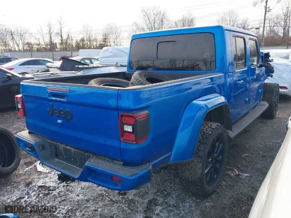 2022 Jeep Gladiator Overland with VIN 1C6HJTFG2NL143101, listed as a IAAI auction lot 41023145 with 77,124 mi miles. Bid and sale history available at carsss.com. Image 4.