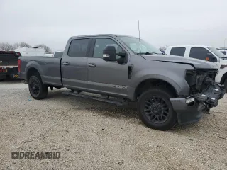 2021 Ford F-350 XL with VIN 1FT8W3BT0MEE06413, listed as a Copart auction lot 42080395 with 140,610 mi miles and Salvage title. Bid and sale history available at DreamBid. Image 4.