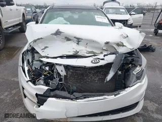 2016 Kia Optima EX with VIN 5XXGU4L30GG120518, listed as a IAAI auction lot 41602190 with 116,268 mi miles. Bid and sale history available at carsss.com. Image 12.