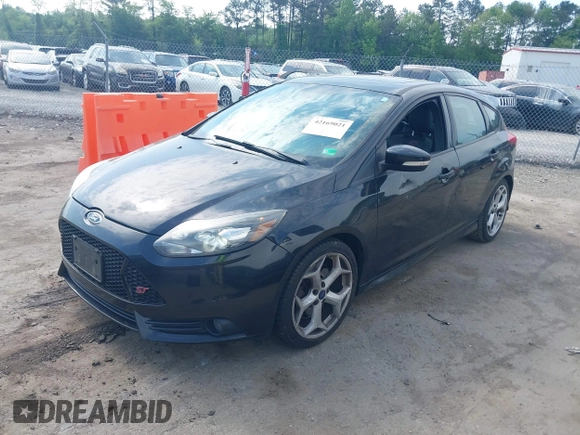 2014 Ford Focus ST with VIN 1FADP3L98EL269058, listed as a IAAI auction lot 42169021 with 106,325 mi miles and . Bid and sale history available at carsss.com. Image 17.