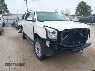 2015 GMC Yukon XL SLT with VIN 1GKS1HKC6FR178371, listed as a IAAI auction lot 41896486 with 159,282 mi miles. Bid and sale history available at carsss.com. Image 1.