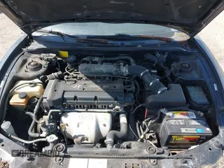 2000 Hyundai Tiburon z VIN KMHJG35F5YU191588, wystawiony jako IAAI lot #41934653 z przebiegiem 161 590 mil mil oraz . Historia ofert i sprzedaży dostępna na DreamBid. Obrazek 10.
