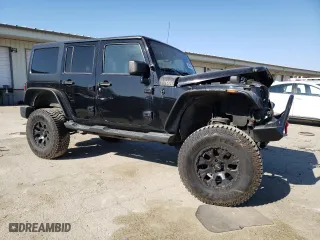 2013 Jeep Wrangler Unlimited Sahara with VIN 1C4BJWEG6DL698827, listed as a Copart auction lot 48284385 with 92,370 mi miles and Salvage Title. Bid and sale history available at carsss.com. Image 4.